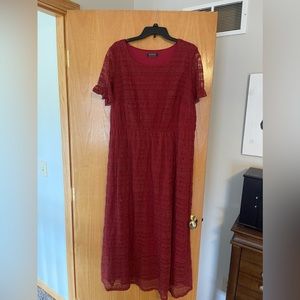 New never worn, rusty red color.